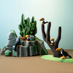 Bumbu Toys | Toucan Standing -Simple Play Stories Bumbu Toys Toucan Standing Baby Sitting Mossy Rocks