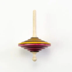 Mader | Tukanino Spinning Top (Level 2) -Simple Play Stories Mader Tukanino Spinning Top Yellow Pink